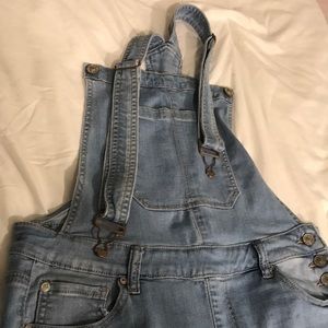 Stretchy, distressed jean overalls